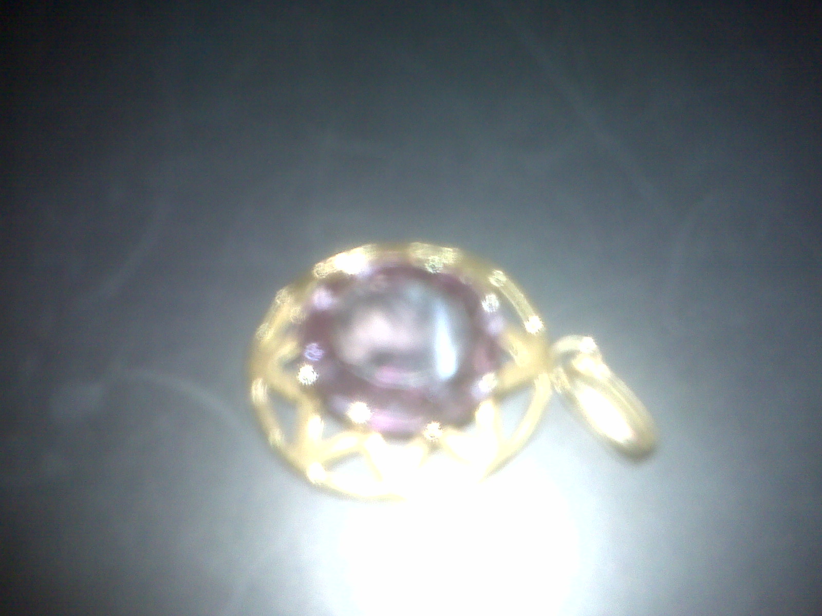 CDATA[If I get it apraised and decide to sell it; where do i sell it?It is set on a unique setting i have never seen before. I have been looking on the net for the same kind of setting and cant find one that is similar to mine. seems like an 8 pointer star and the alexandrite is oval i think. any info or like to say anything feel free to. Thanks
![USR-004-00193__IMG00596-20110531-2318.jpg